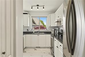 5425 Leslie Cres — listing photo 26 of 63