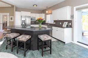 8593 Kingcome Cres — listing photo 13 of 50