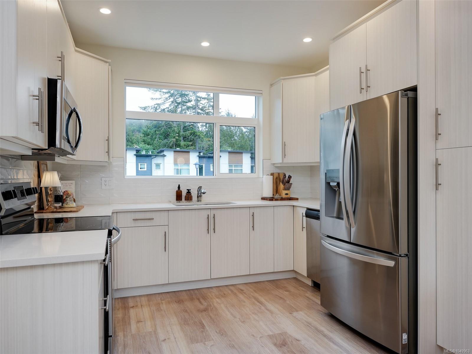 102-3559 Vision Way — listing photo 6 of 26