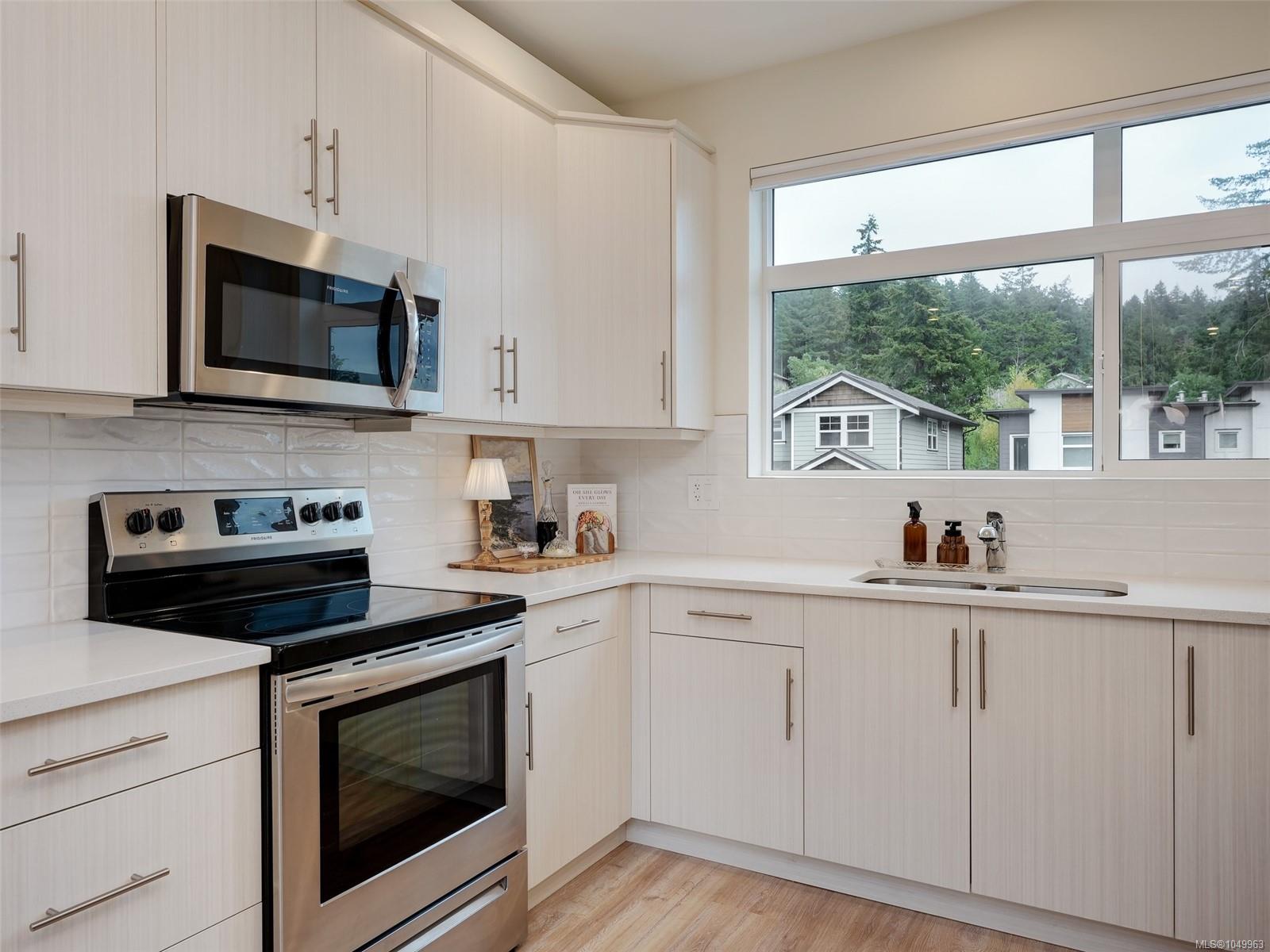 102-3559 Vision Way — listing photo 7 of 26