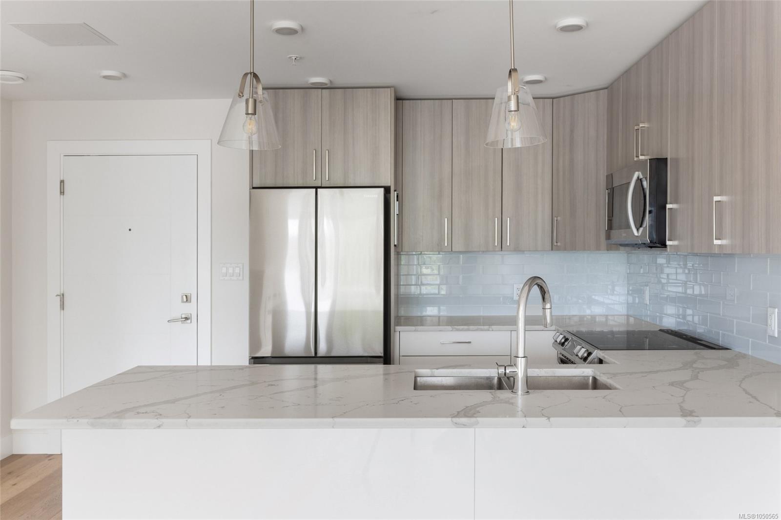 306-7098 Wallace Dr — listing photo 3 of 21