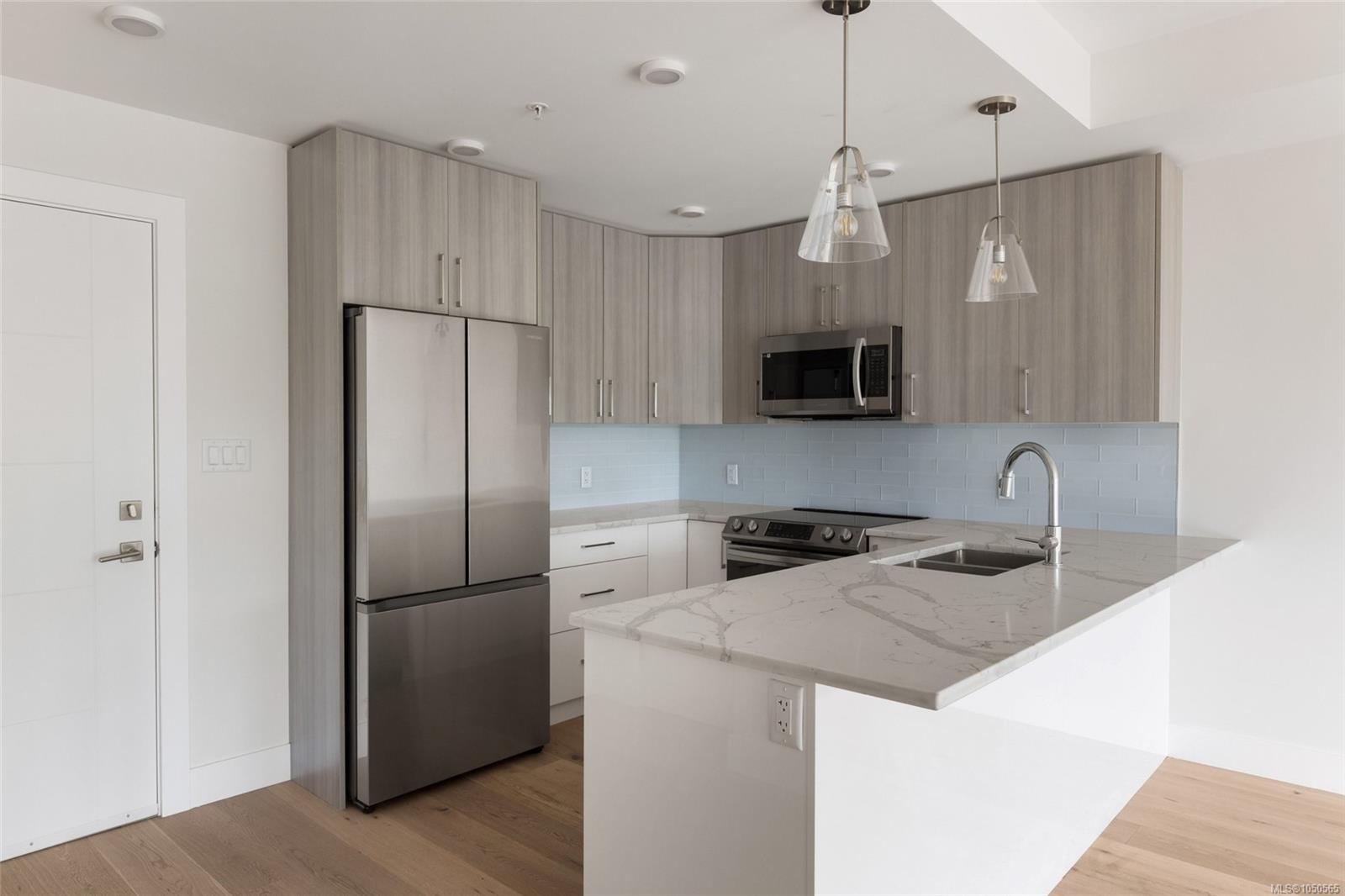 306-7098 Wallace Dr — listing photo 7 of 21