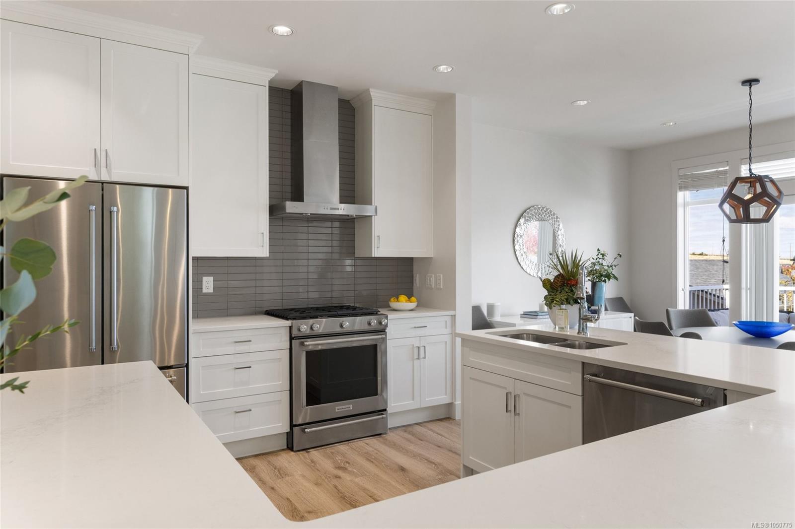 3517 Ryder Hesjedal Way — listing photo 9 of 56
