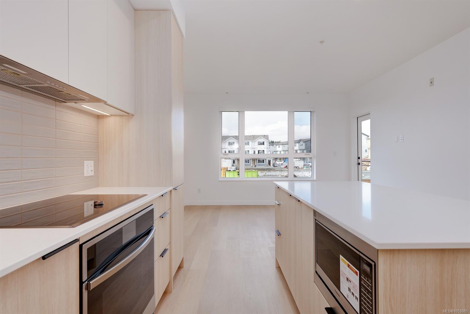 212-3564 Ryder Hesjedal Way — listing photo 10 of 35
